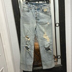 distressed button up jeans